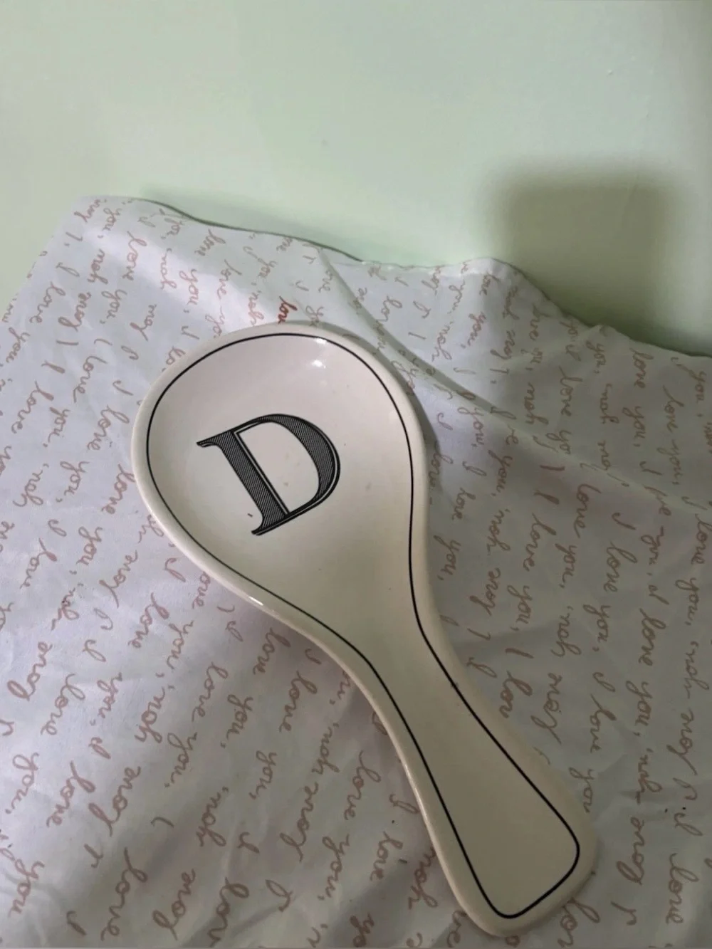 Monogram 'D' Ceramic Spoon Rest in Cream and Black